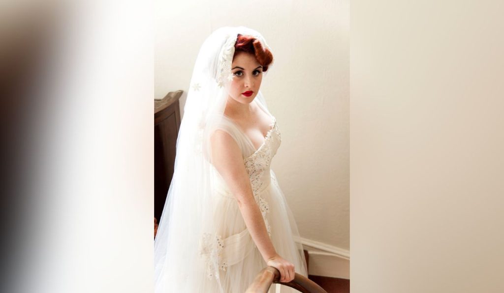 Woman in Abigail’s Vintage Bridal Italian outfit
