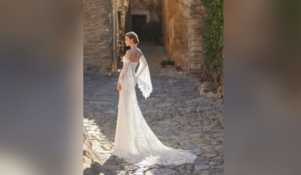 Woman wearing lace vintage Italian  wedding dress
