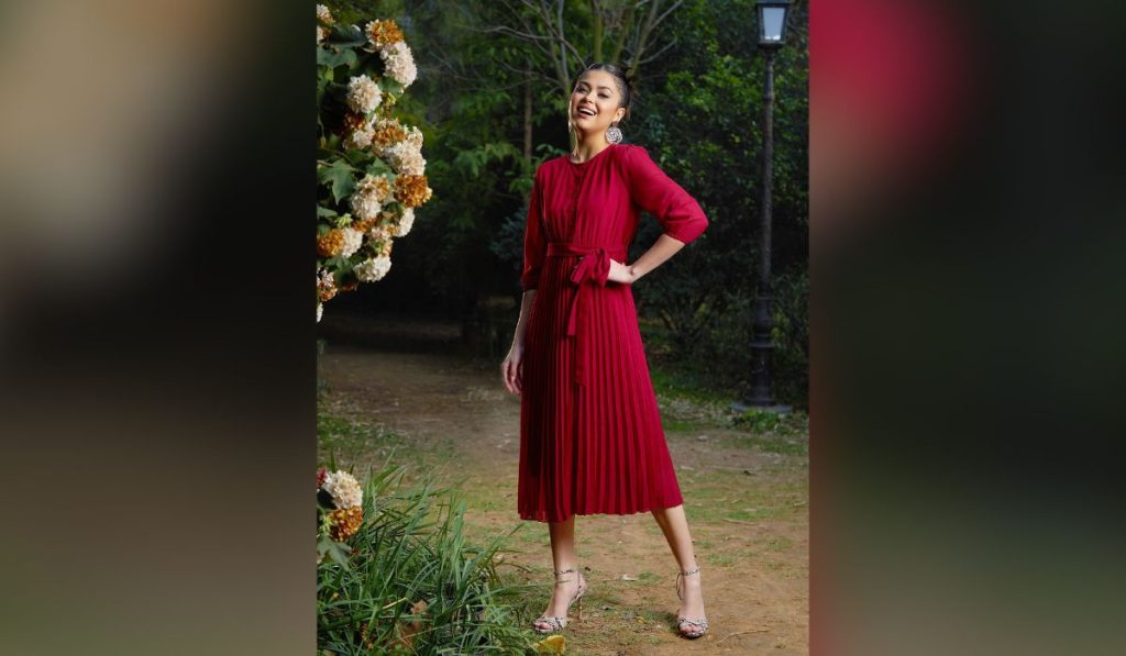 Woman wearing Pleated Midi Dress