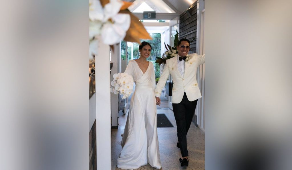 Couple wearing white in their Italian wedding